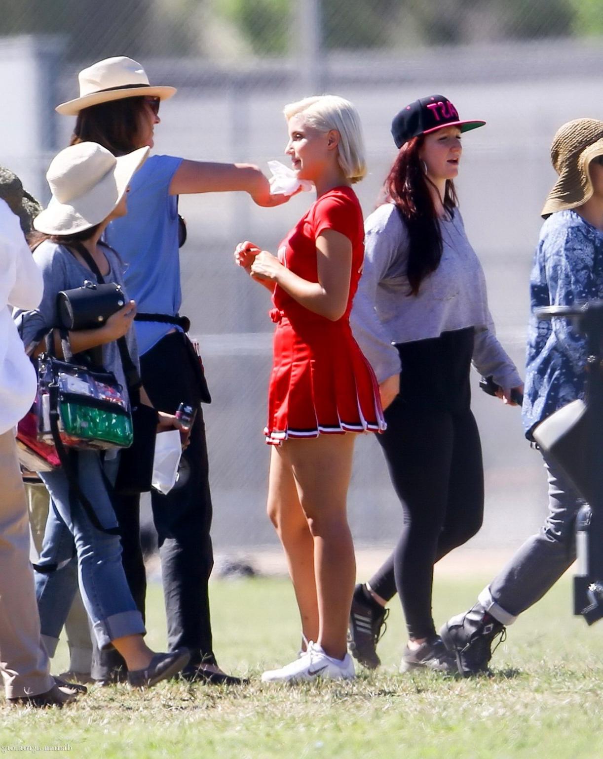 16P Dianna Agron in cheerleader outfit flashing her red panties on Glee season 6 set