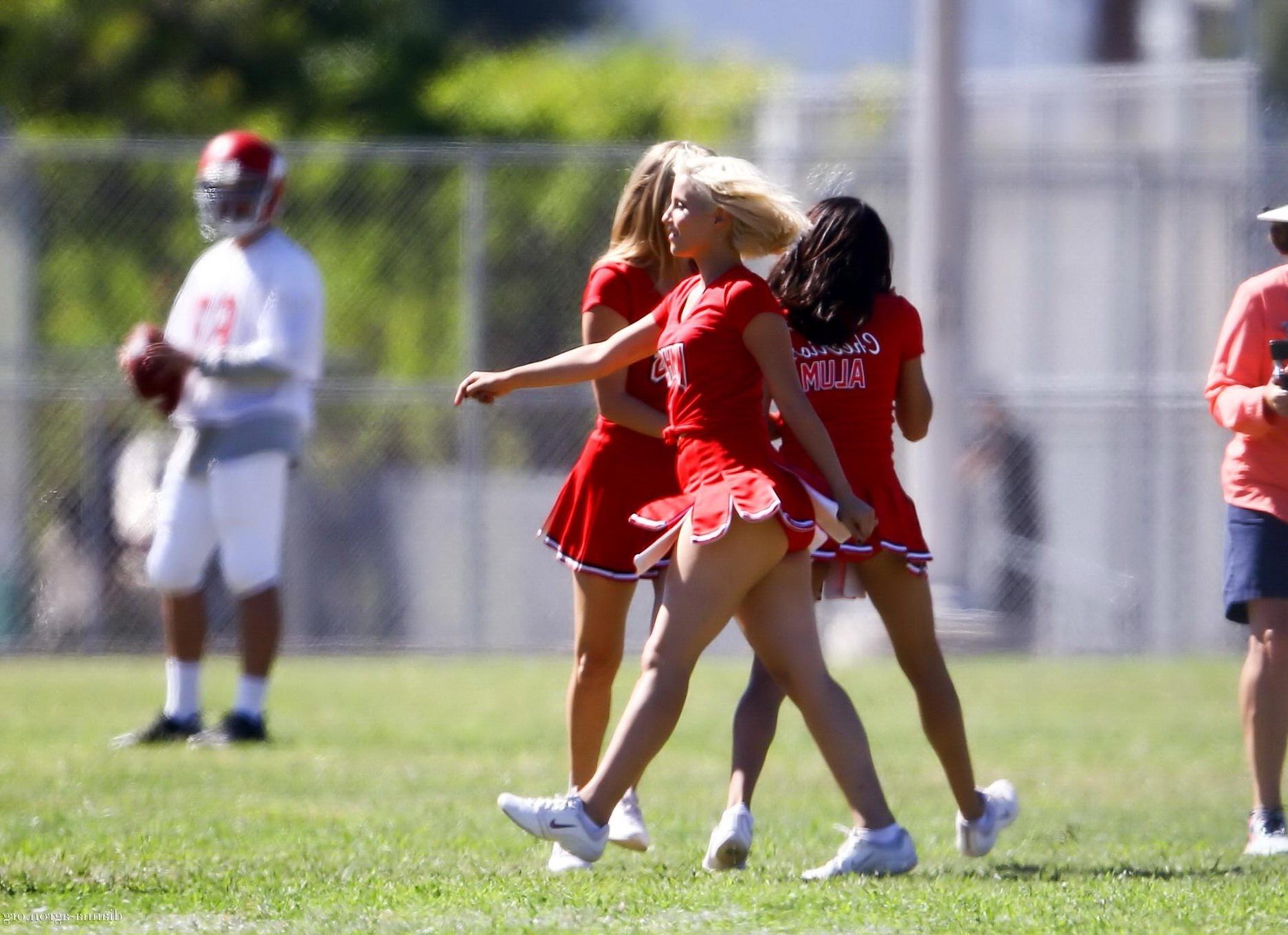 16P Dianna Agron in cheerleader outfit flashing her red panties on Glee season 6 set