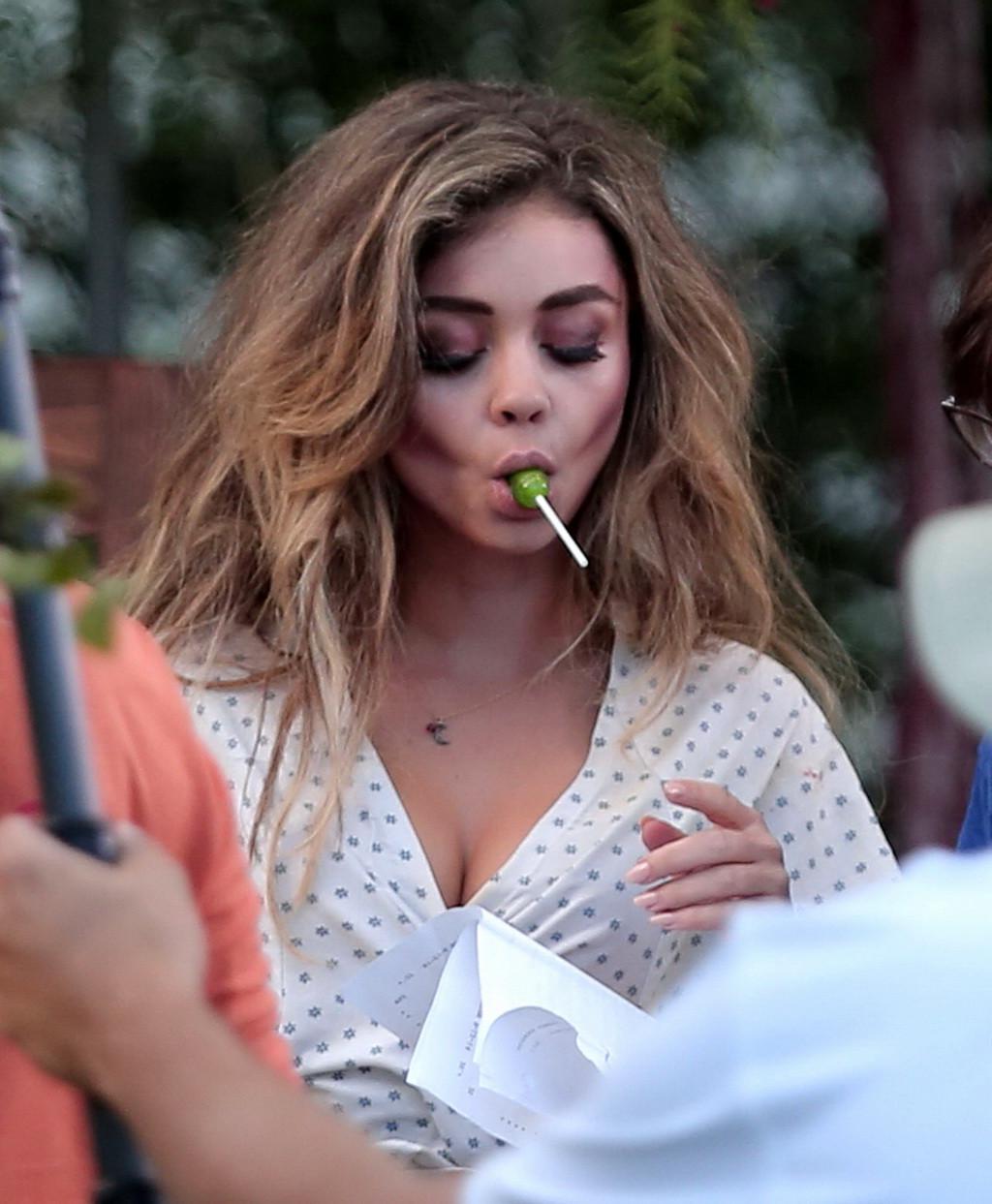 16P Sarah Hyland cleavy and sucking a lollipop on the Modern Family set in LA
