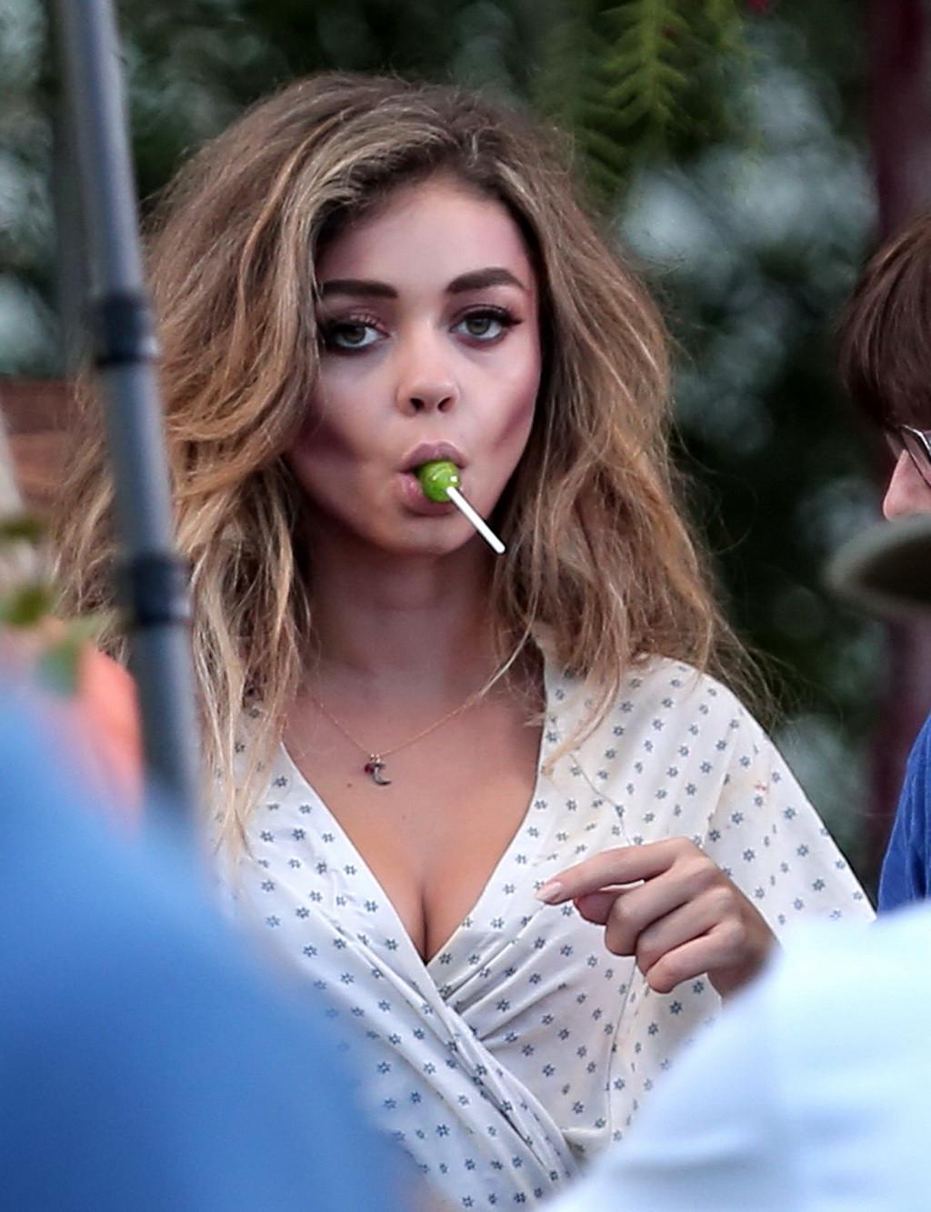 16P Sarah Hyland cleavy and sucking a lollipop on the Modern Family set in LA