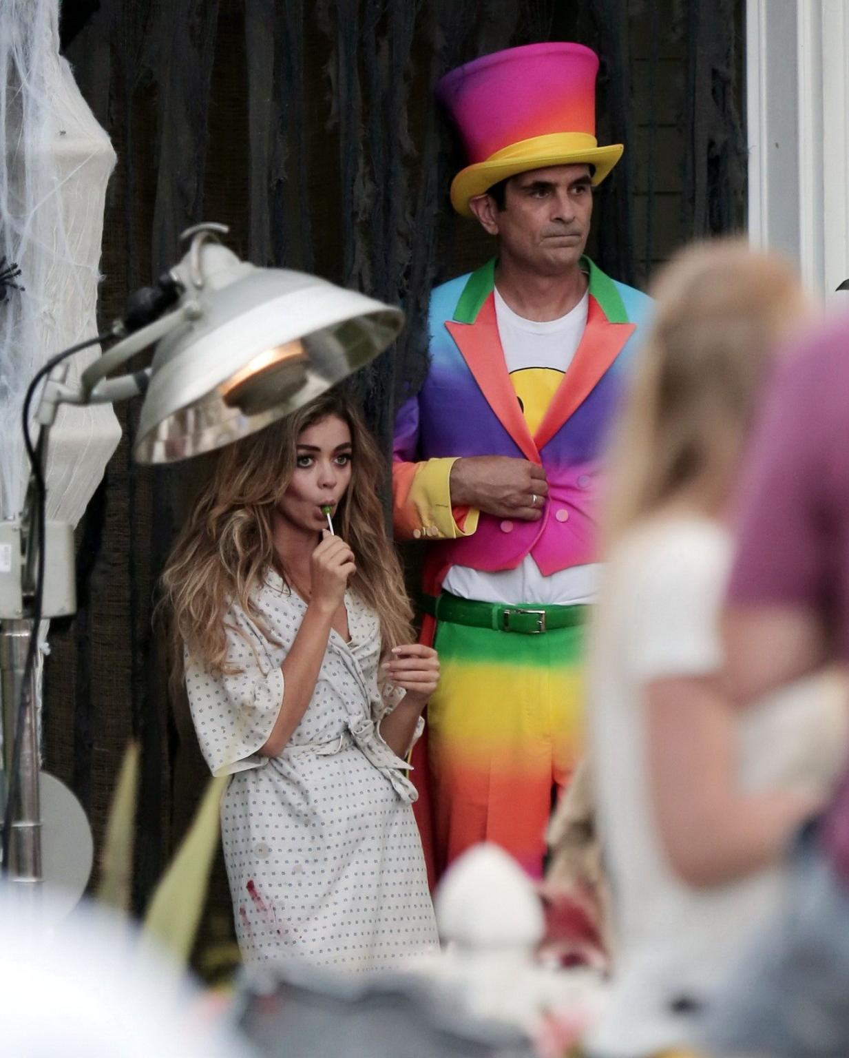 16P Sarah Hyland cleavy and sucking a lollipop on the Modern Family set in LA