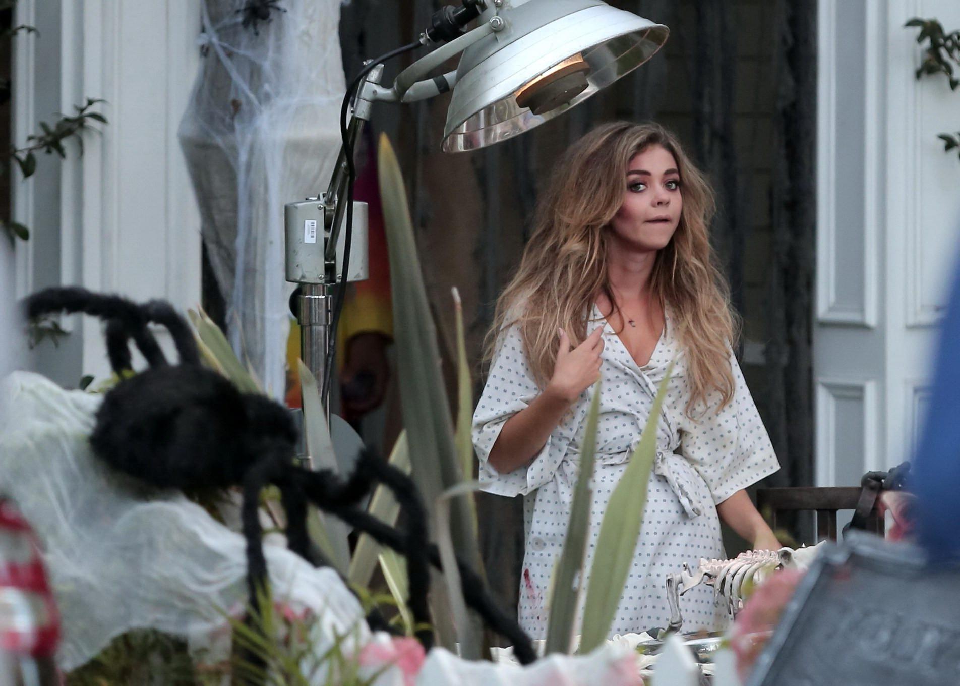 16P Sarah Hyland cleavy and sucking a lollipop on the Modern Family set in LA