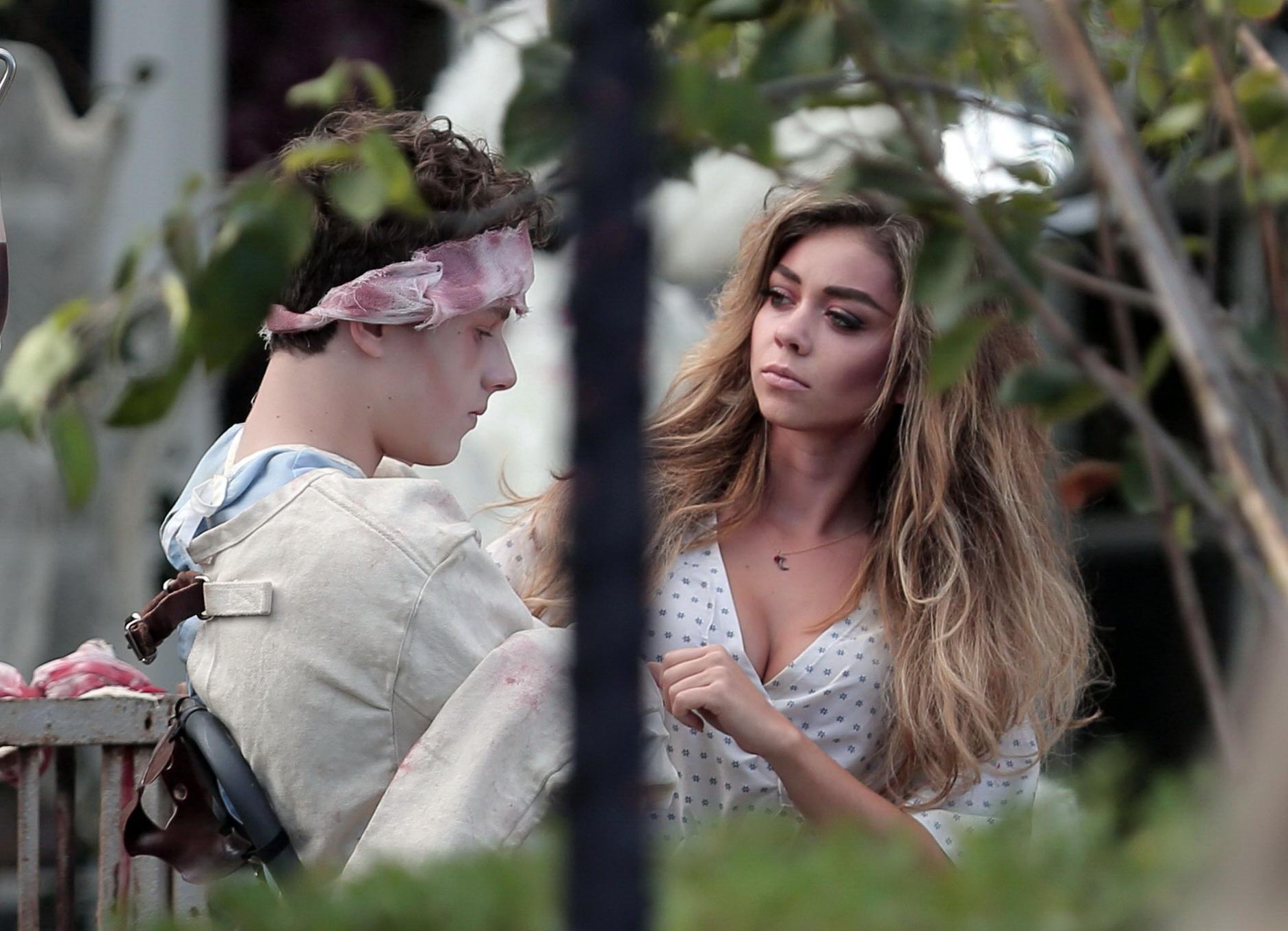 16P Sarah Hyland cleavy and sucking a lollipop on the Modern Family set in LA