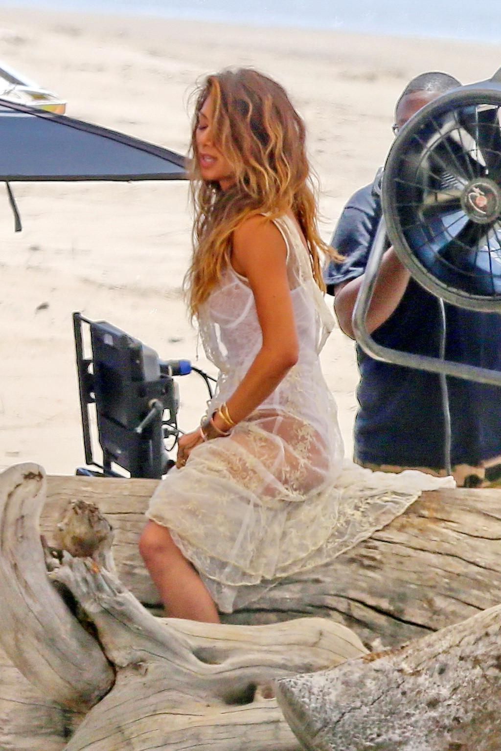 16P Nicole Scherzinger nip slip on the set of her new music video in Malibu