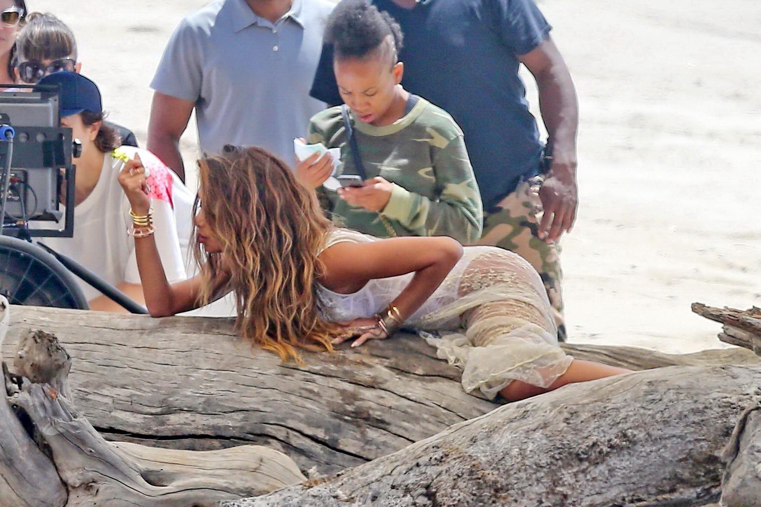 16P Nicole Scherzinger nip slip on the set of her new music video in Malibu