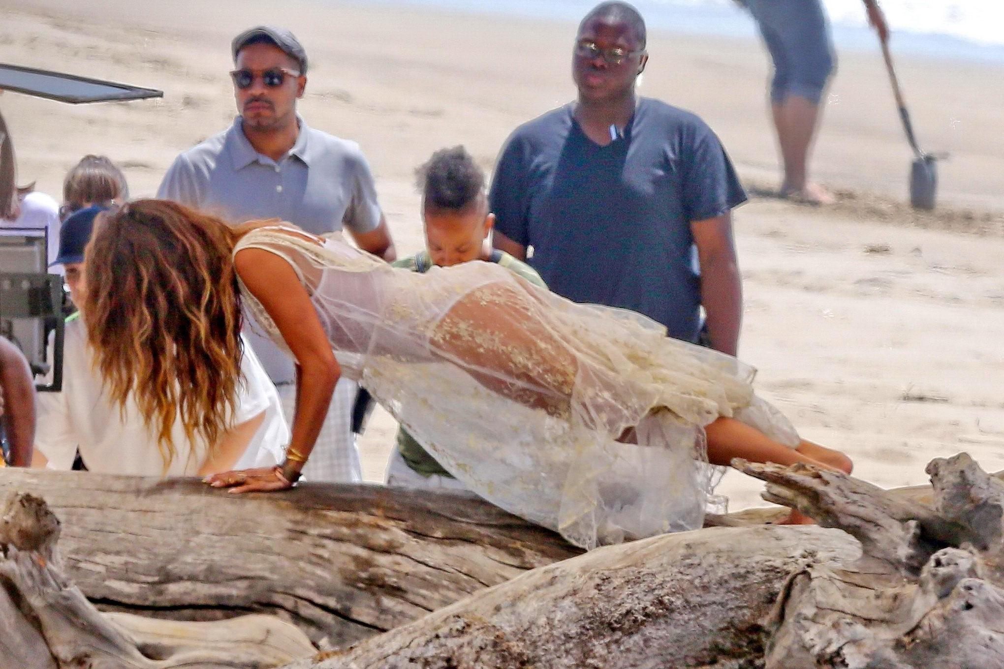 16P Nicole Scherzinger nip slip on the set of her new music video in Malibu
