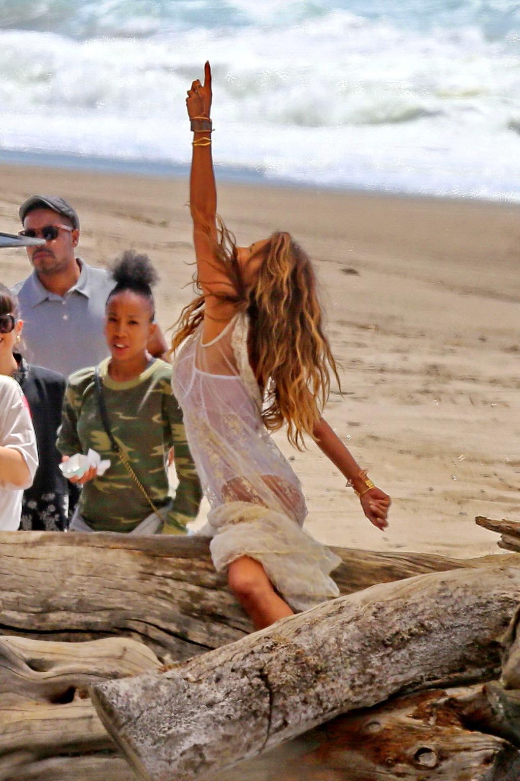 16P Nicole Scherzinger nip slip on the set of her new music video in Malibu