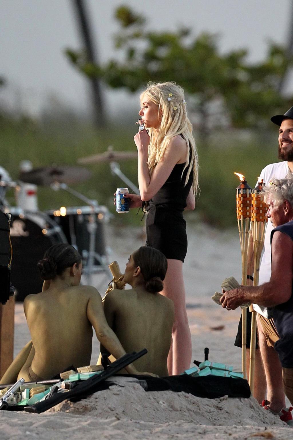 16P Taylor Momsen shooting a music video on Miami Beach with two bodypainted models