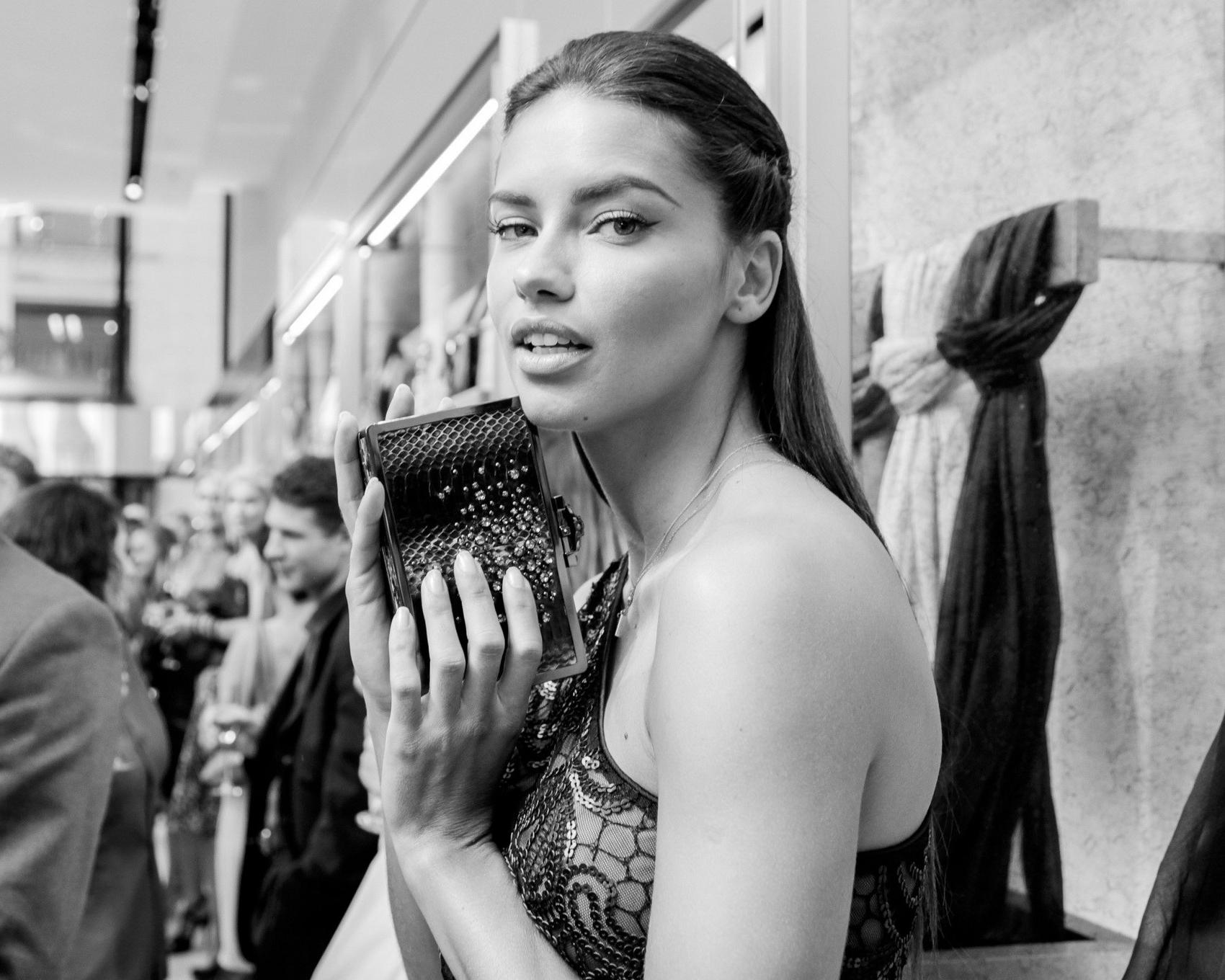 16P Adriana Lima celebrating her birthday in black transparent mini dress at the VC 