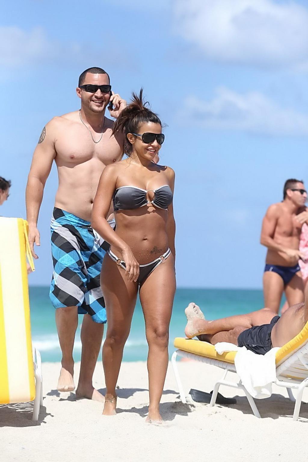 16P Vida Guerra showing off her curvy body in a thong gray bikini at South Beach