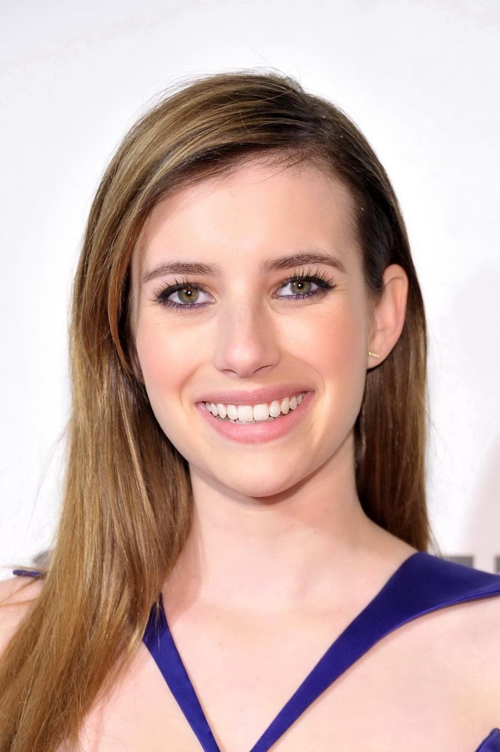 16P Emma Roberts looks very sexy wearing a purple dress for the 'Adult World' premie