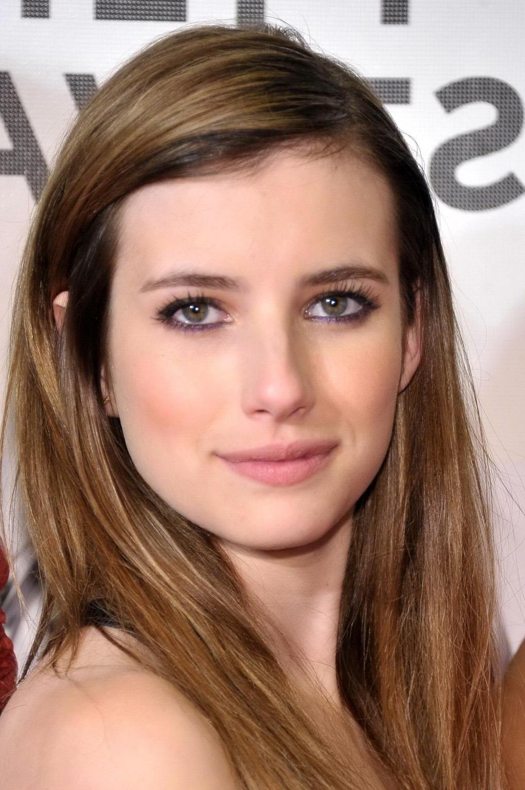 16P Emma Roberts looks very sexy wearing a purple dress for the 'Adult World' premie