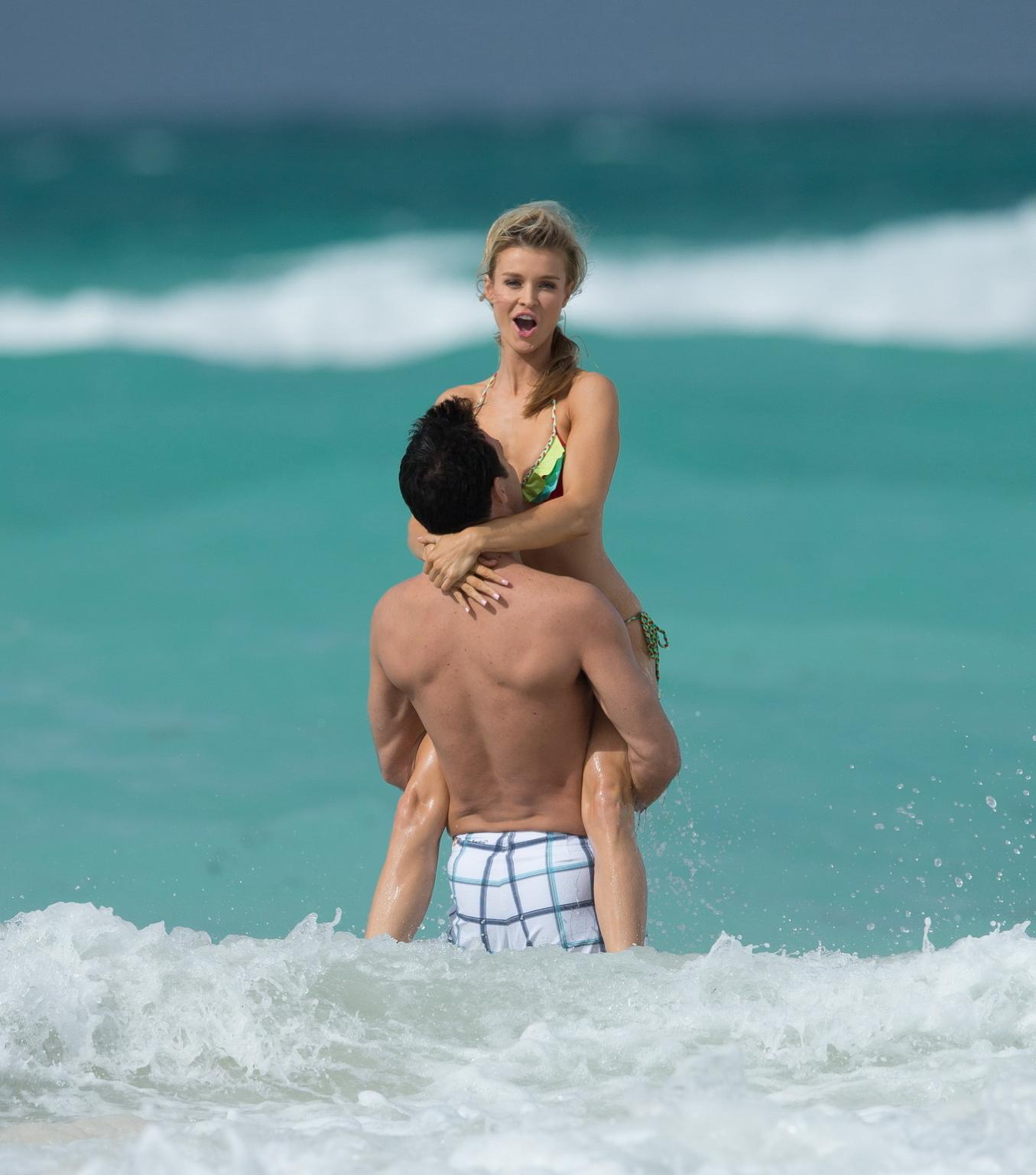 10P Joanna Krupa wearing colorful thong bikini on the beach in Miami