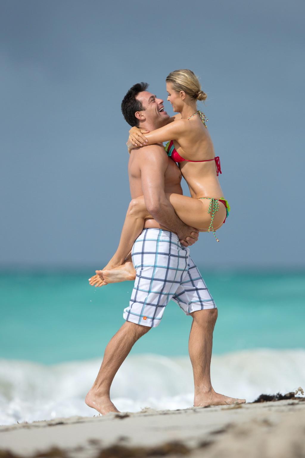 10P Joanna Krupa wearing colorful thong bikini on the beach in Miami