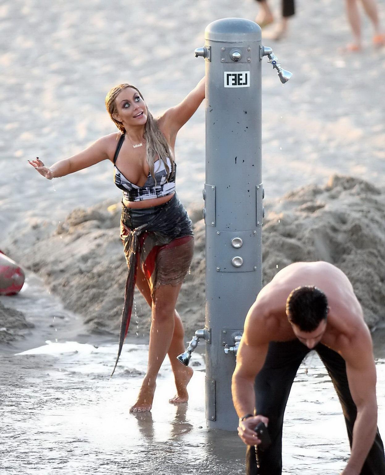 9P Aubrey O'Day busty in wet summer dress shooting a music video on the beach in Sa