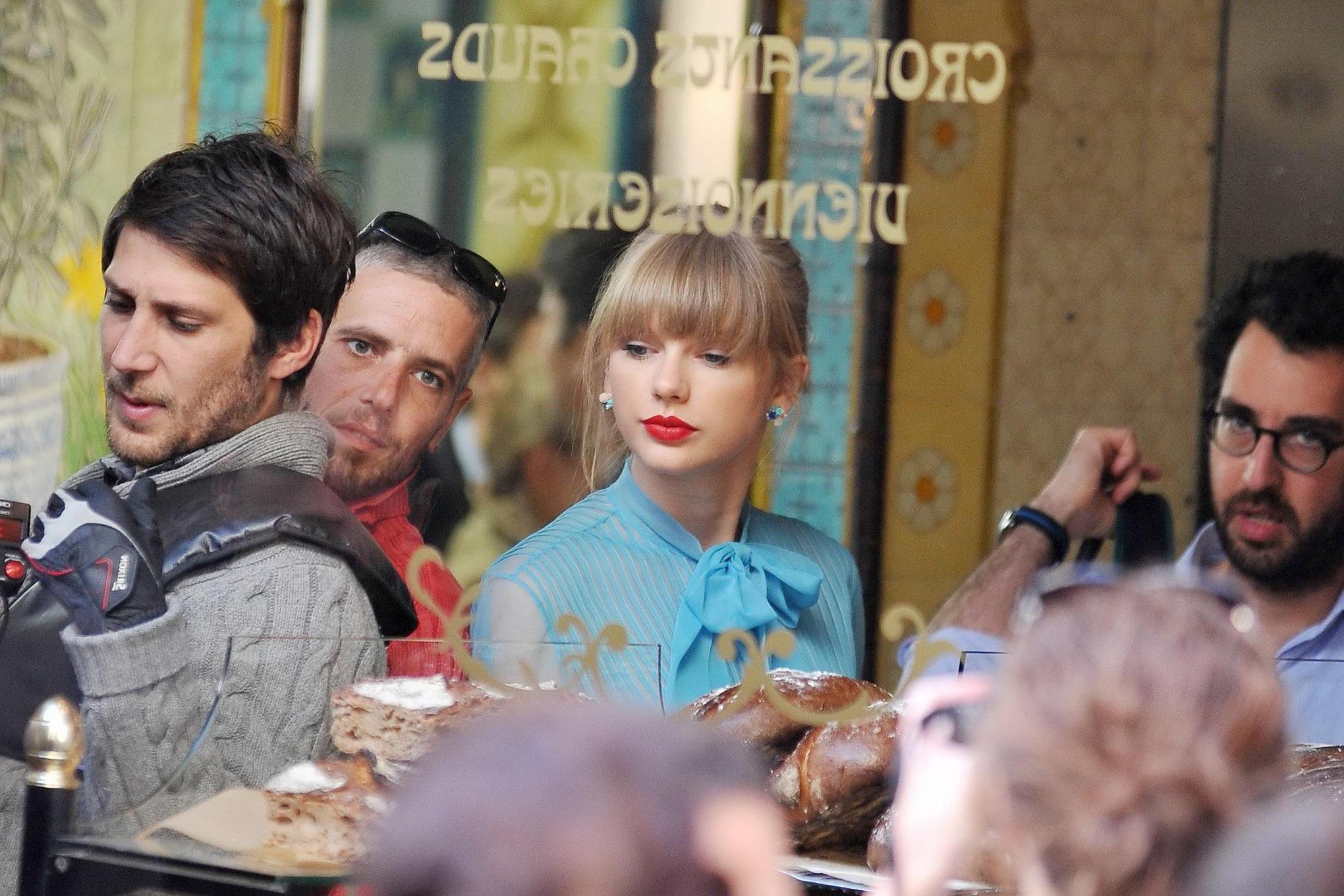 8P Taylor Swift see through to bra while riding a bike on the music video set