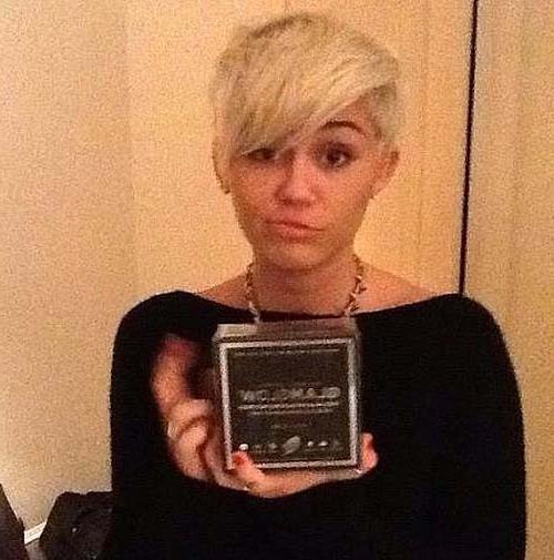 10P Miley Cyrus with new short haircut on private photos
