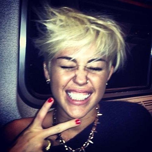 10P Miley Cyrus with new short haircut on private photos