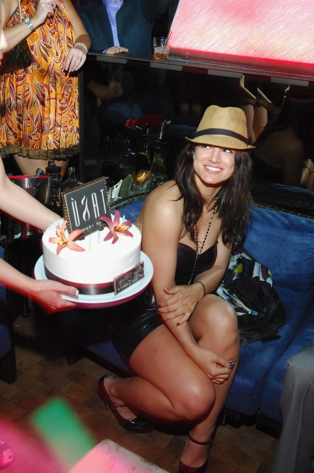 10P Gina Carano leggy wearing a leather mini dress at the birthday party in Las Vega