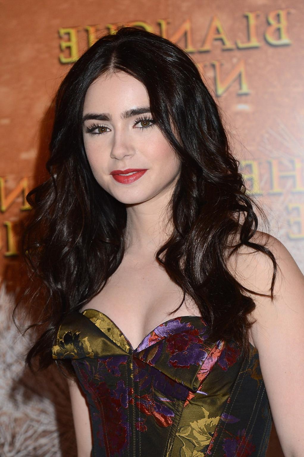 16P Lily Collins braless in the strapless dres at Mirror Mirror premiere in Paris