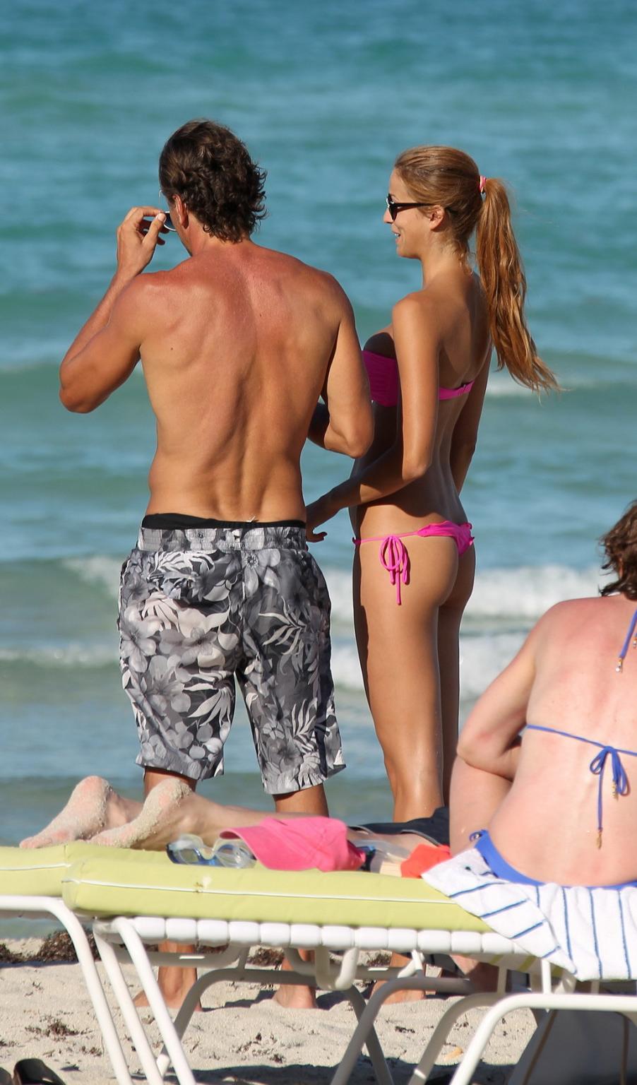 16P Lauren Stoner showing off her ass in pink thong bikini at the beach in Miami