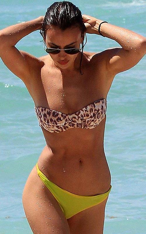 16P Irina Shayk exposing sexy body and hot ass in thong on beach