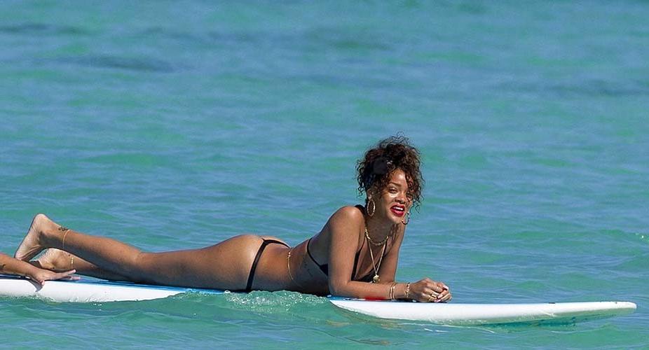 16P Rihanna exposing sexy body and hot ass in thong while surfing