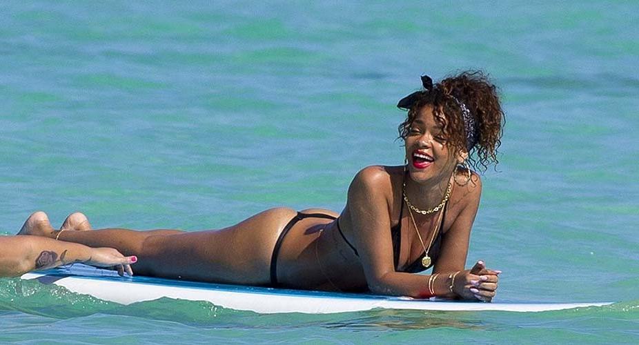 16P Rihanna exposing sexy body and hot ass in thong while surfing