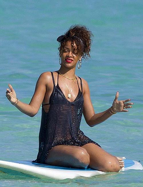 16P Rihanna exposing sexy body and hot ass in thong while surfing