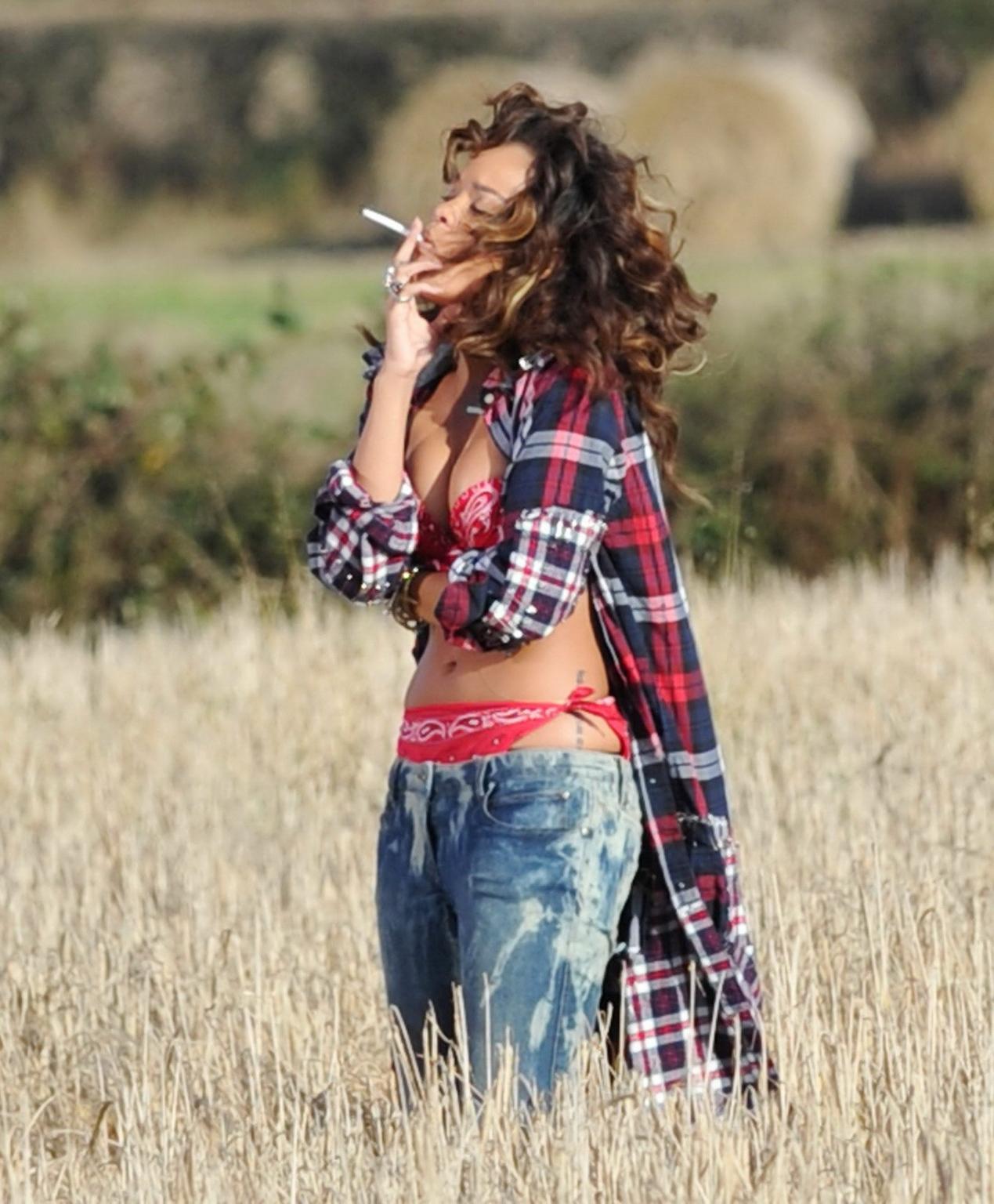16P Rihanna braless in see through top shooting a music video in Ireland