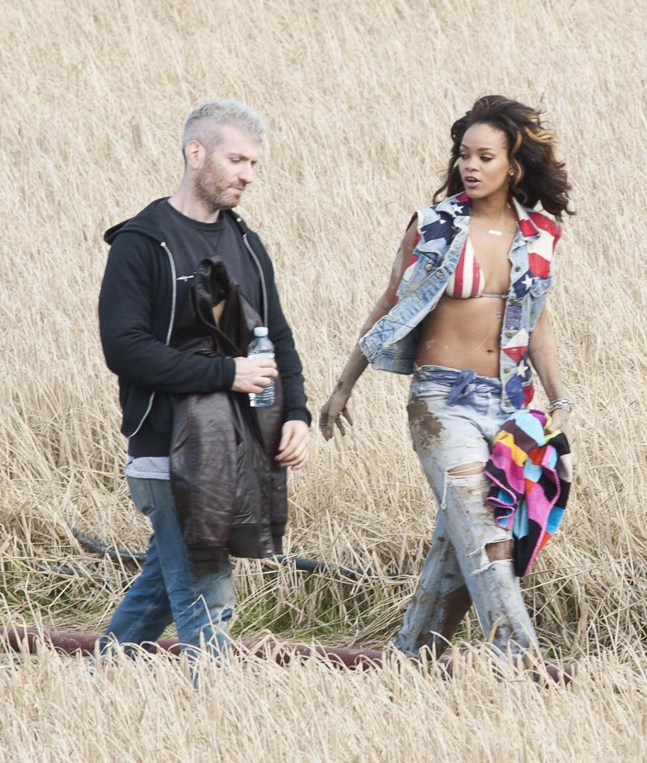 16P Rihanna braless in see through top shooting a music video in Ireland