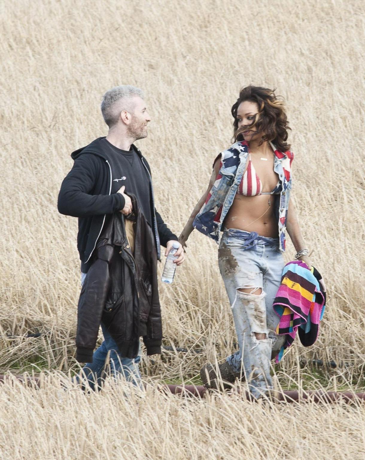 16P Rihanna braless in see through top shooting a music video in Ireland
