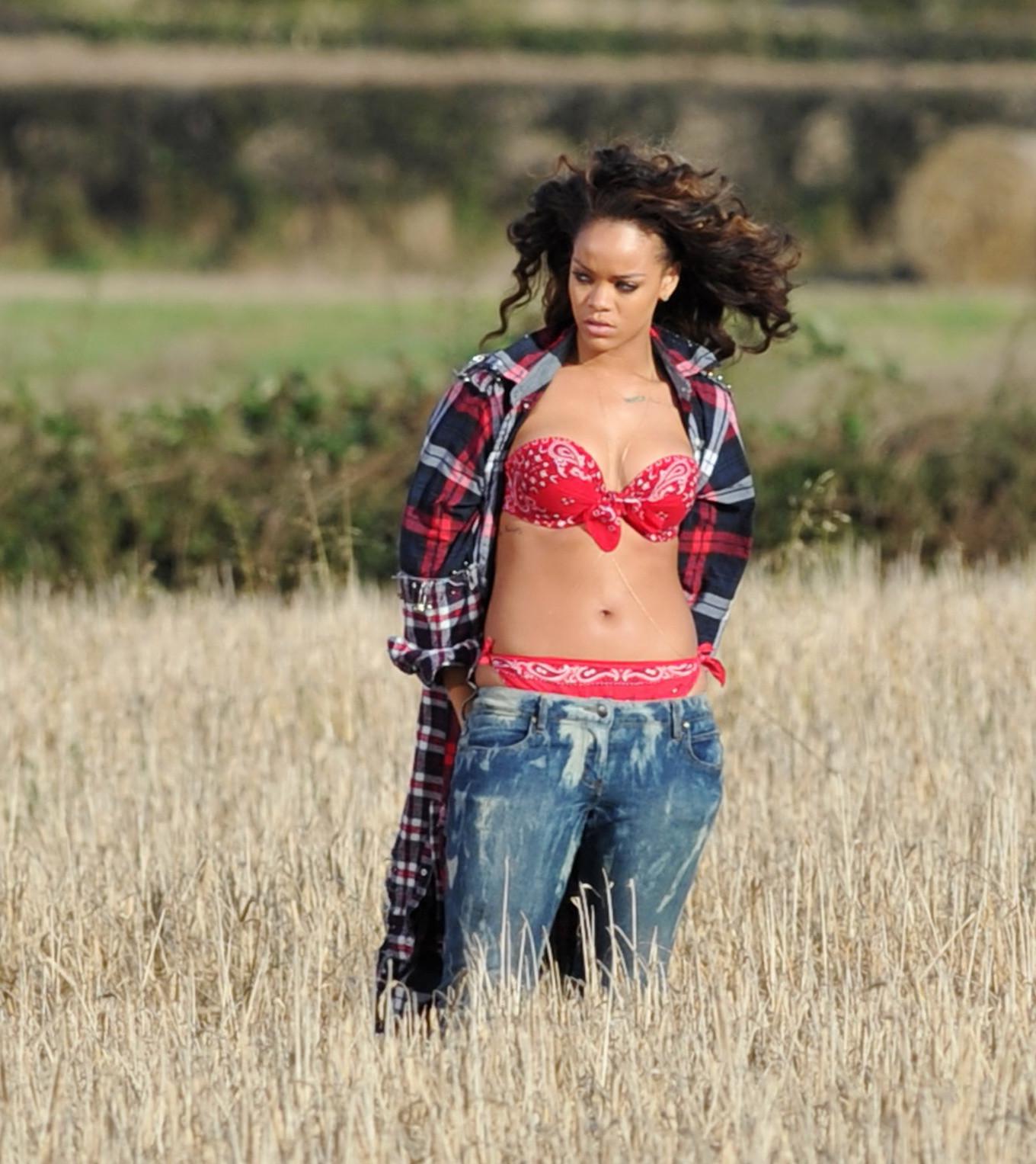 16P Rihanna braless in see through top shooting a music video in Ireland