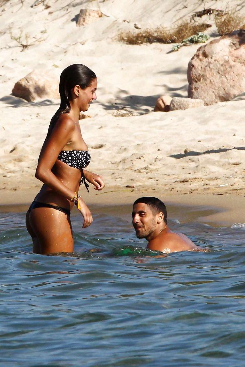 16P Melissa Satta showing her fantastic ass in thong bikini on beach paparazzi pictu