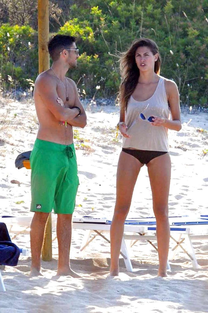 16P Melissa Satta showing her fantastic ass in thong bikini on beach paparazzi pictu