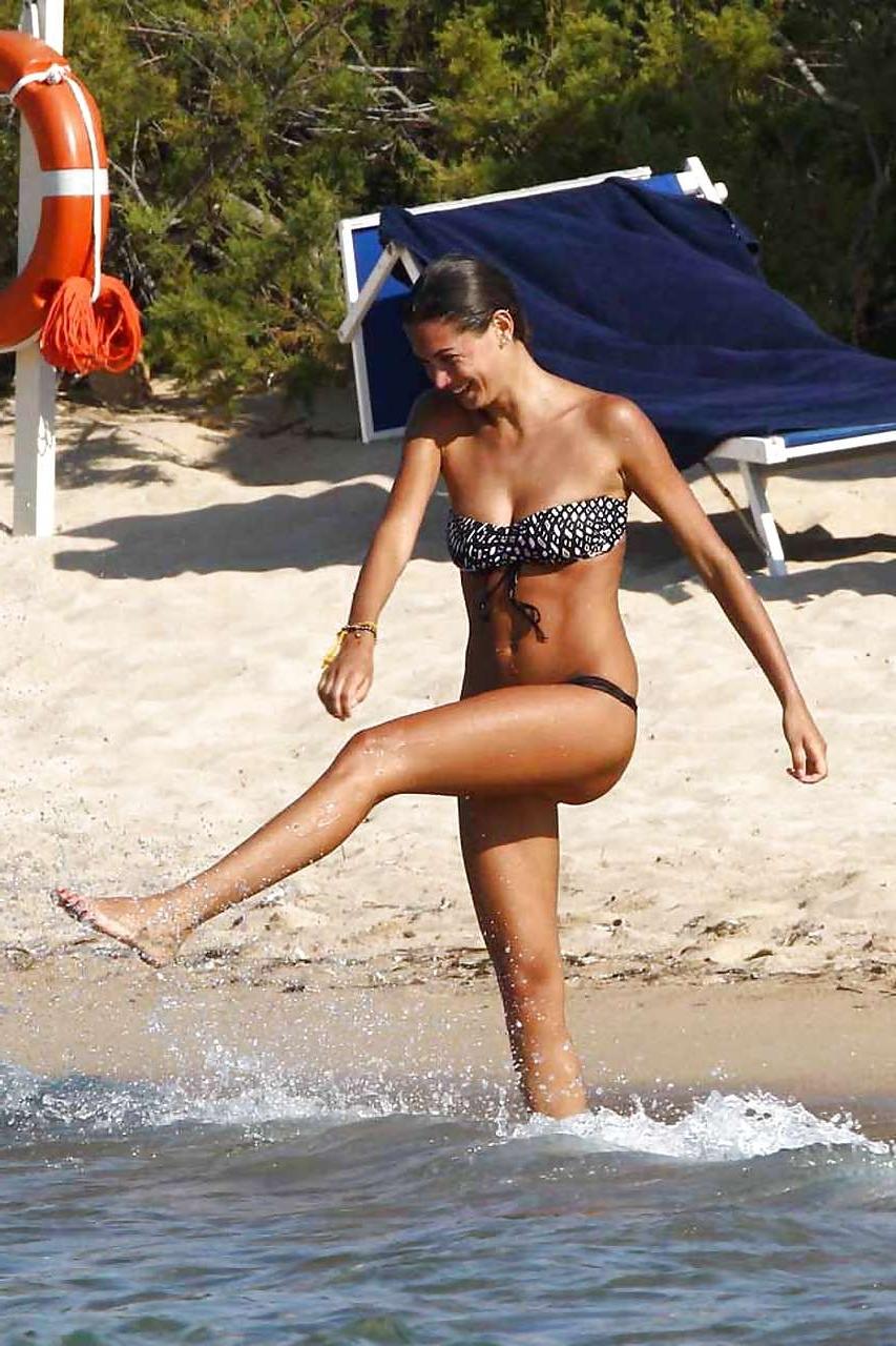 16P Melissa Satta showing her fantastic ass in thong bikini on beach paparazzi pictu
