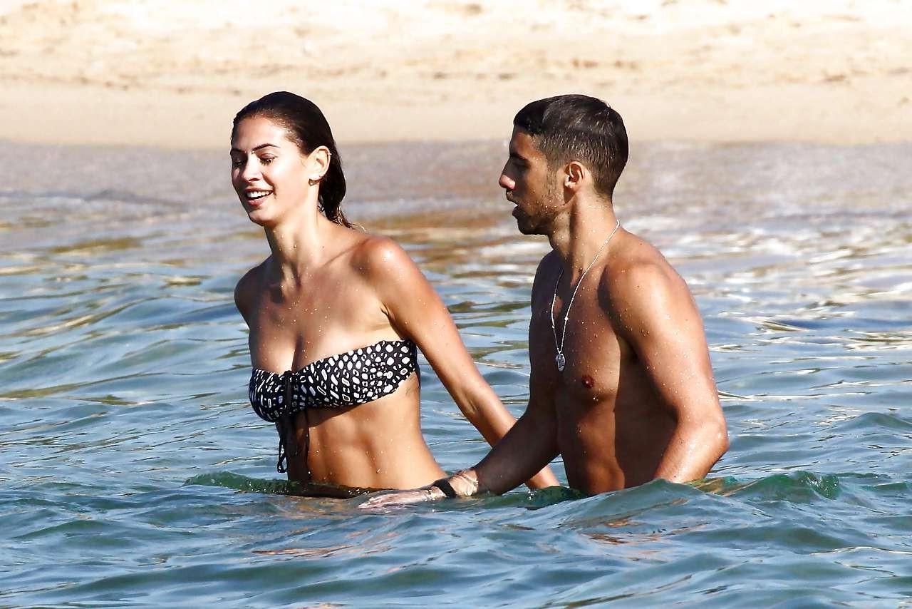 16P Melissa Satta showing her fantastic ass in thong bikini on beach paparazzi pictu