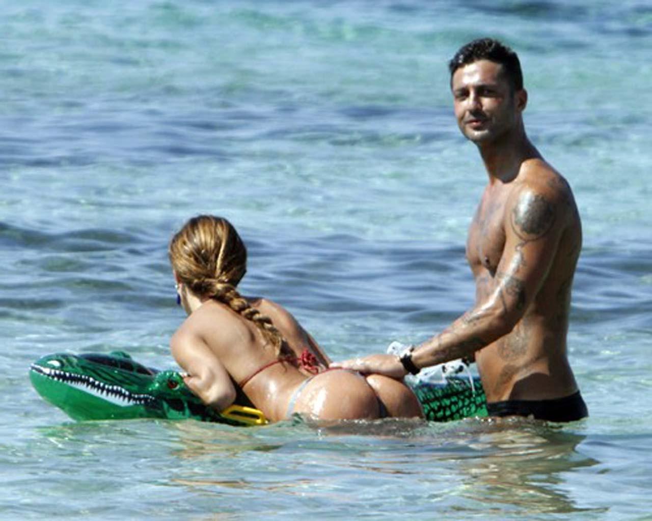 16P Belen Rodriguez exposing sexy body and hot ass in thong on beach