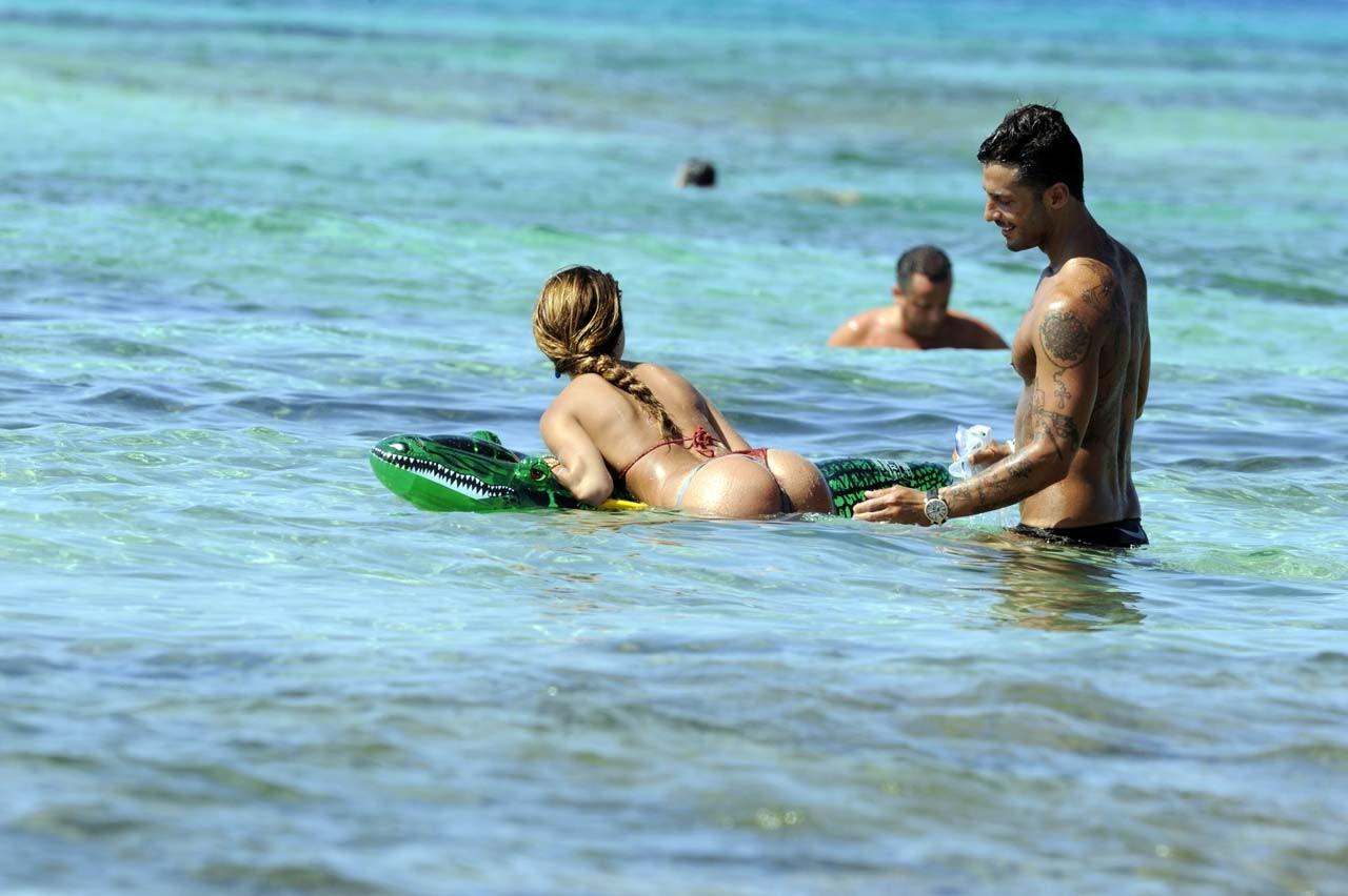 16P Belen Rodriguez exposing sexy body and hot ass in thong on beach