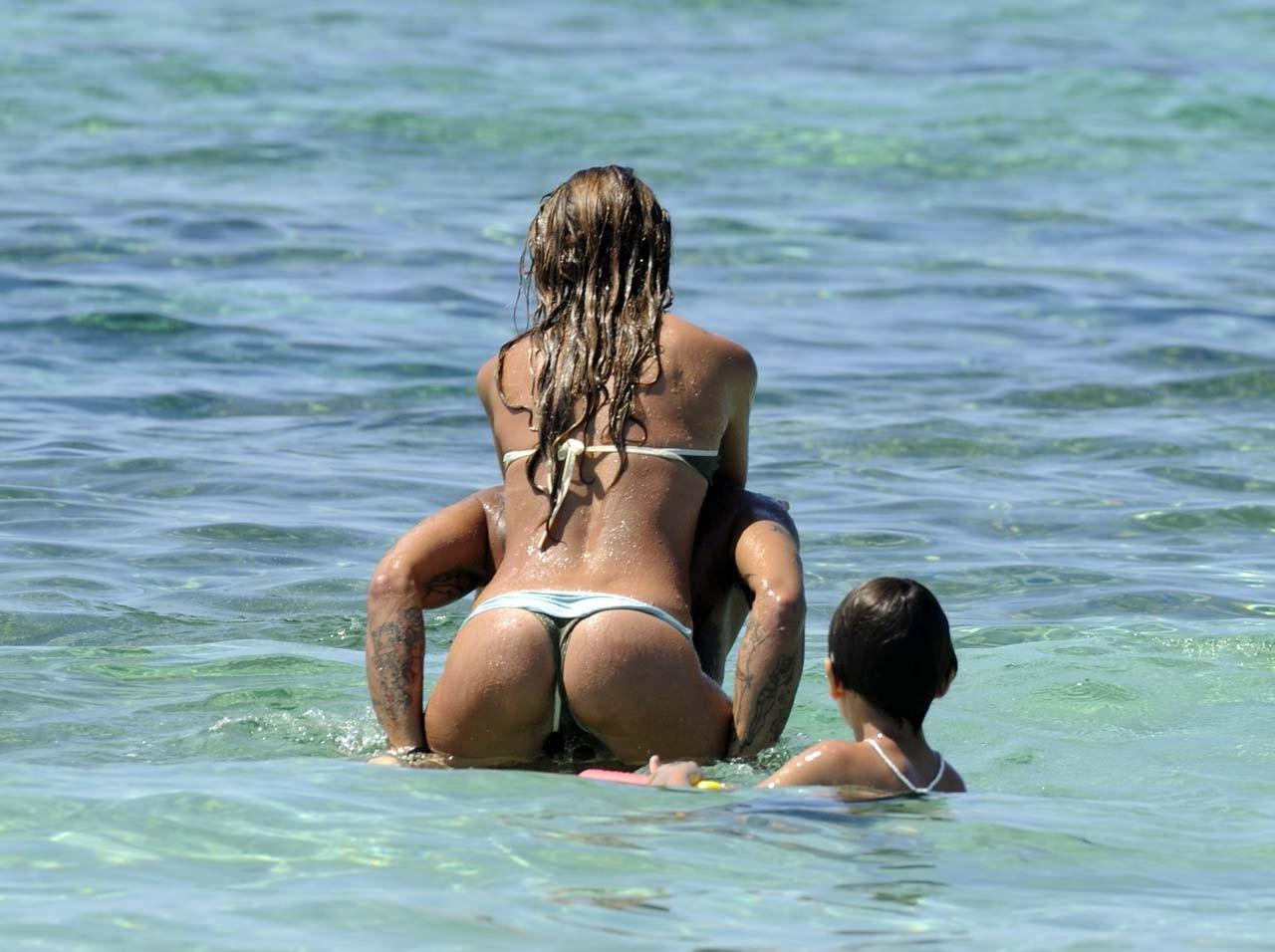 16P Belen Rodriguez exposing sexy body and hot ass in thong on beach