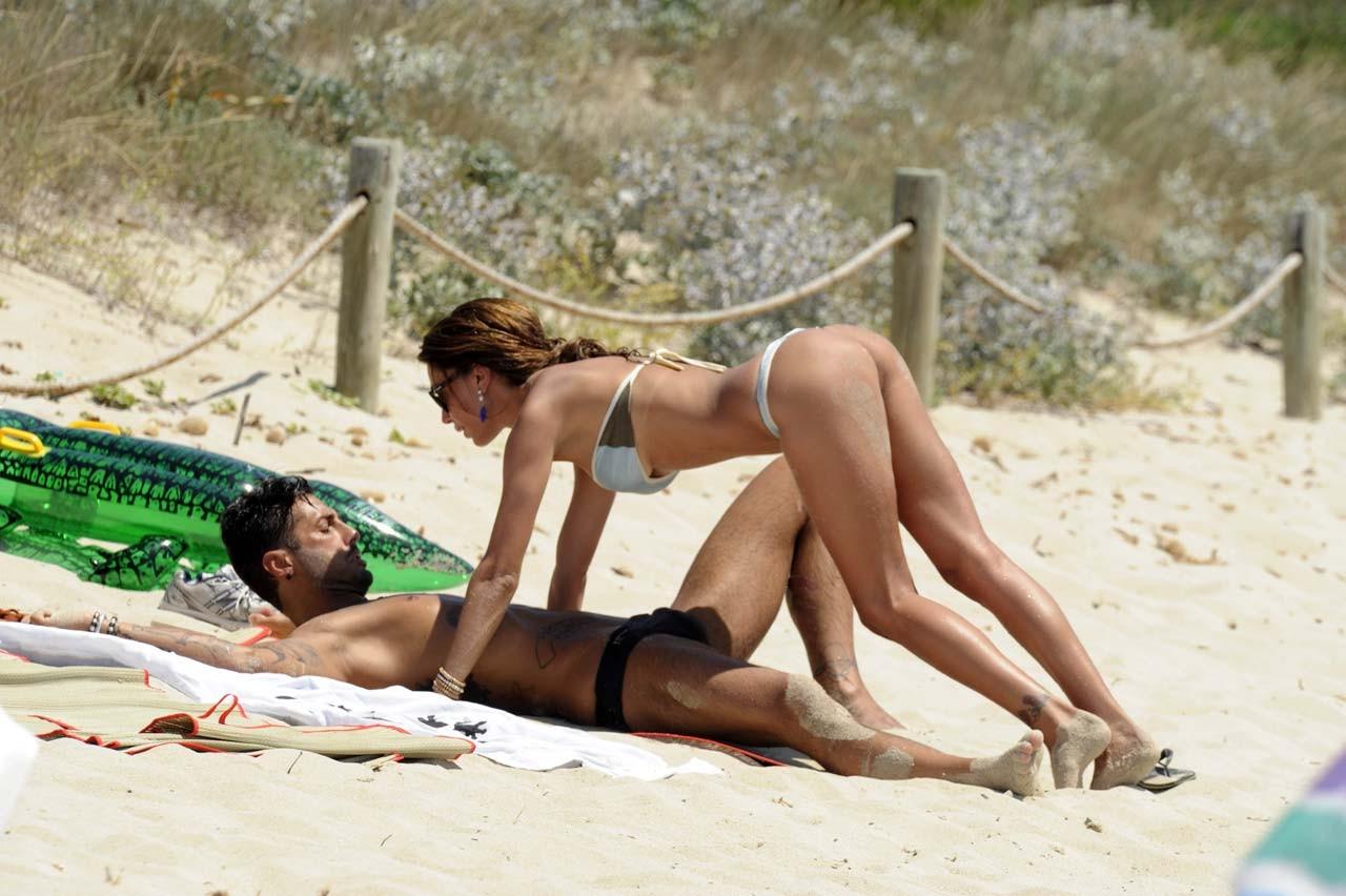 16P Belen Rodriguez exposing sexy body and hot ass in thong on beach