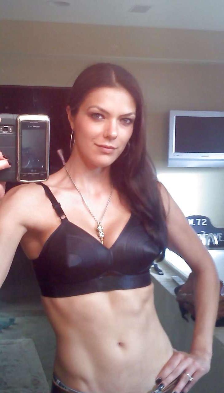 16P Adrianne Curry topless posing in pool and exposing her ass in private photos