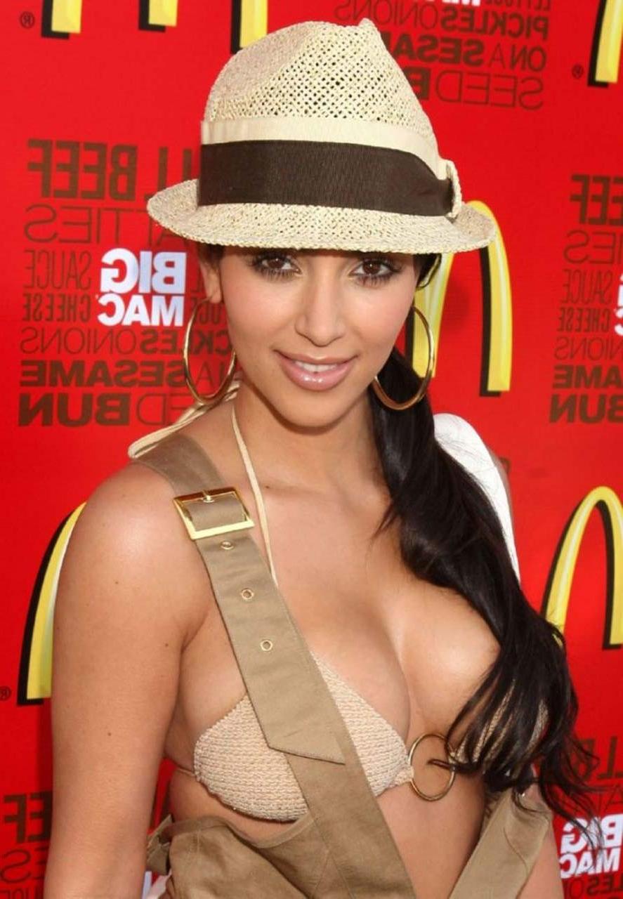 16P Kim Kardashian exposing huge boobs and fucking sexy ass in thong