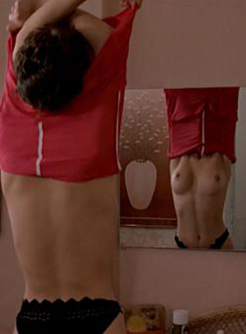 16P Jaime Lee Curtis nice topless in front of a mirror
