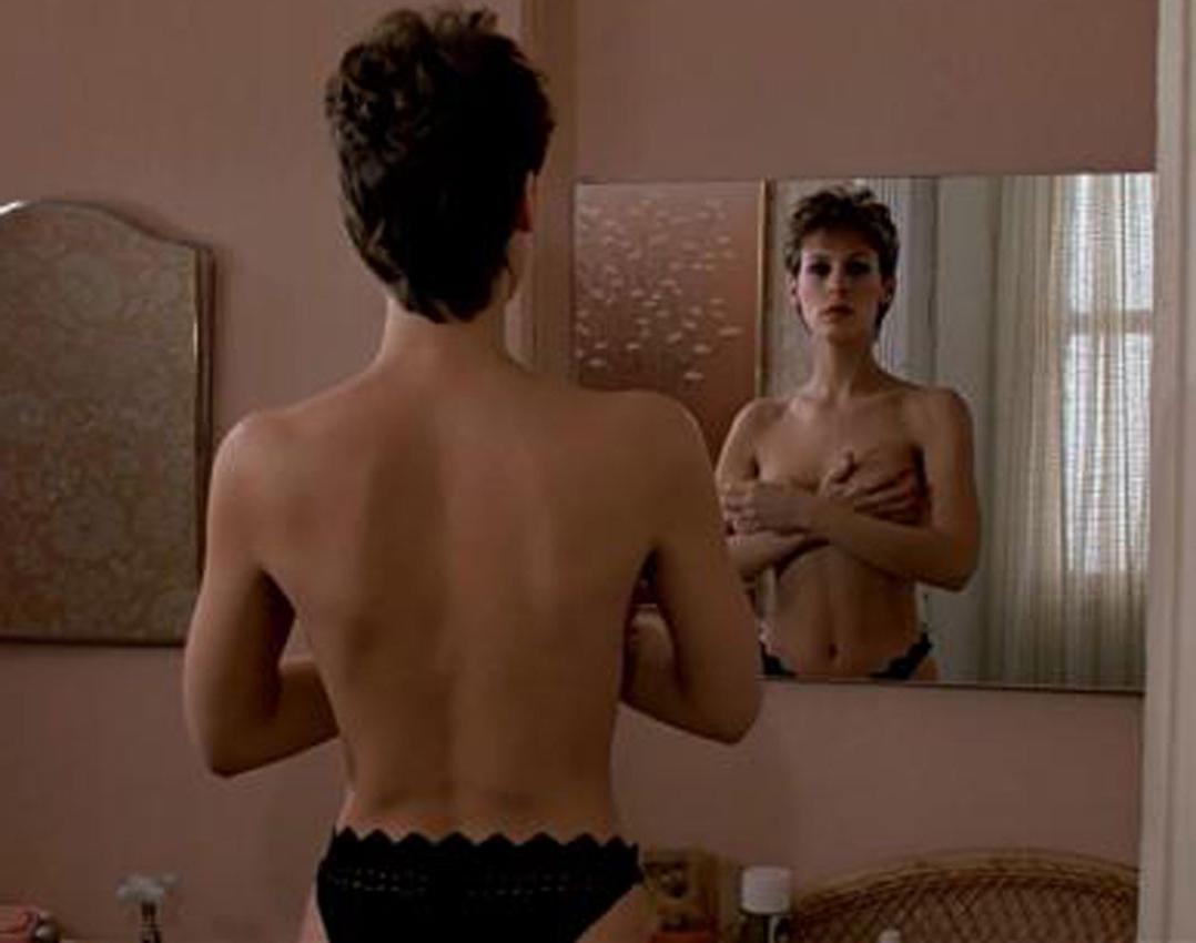 16P Jaime Lee Curtis nice topless in front of a mirror