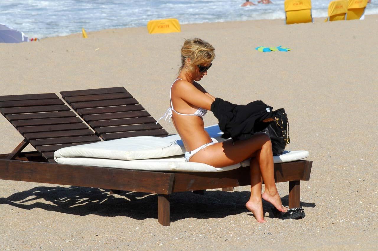 10P Lola Ponce showing her nice ass in thong and sexy in bikini on beach paparazzi s