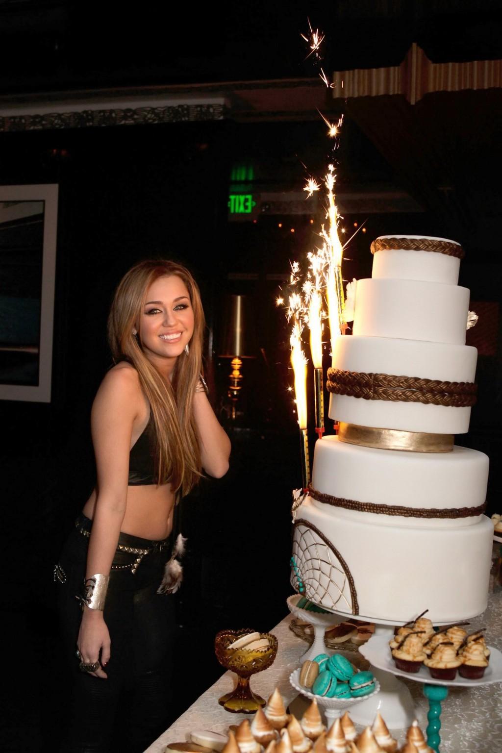 16P Miley Cyrus in see-through dress shooting the Big Bang music video