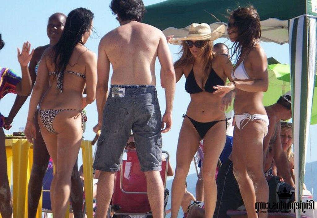 16P Stacy Ferguson showing sexy body and hot ass in thong on beach
