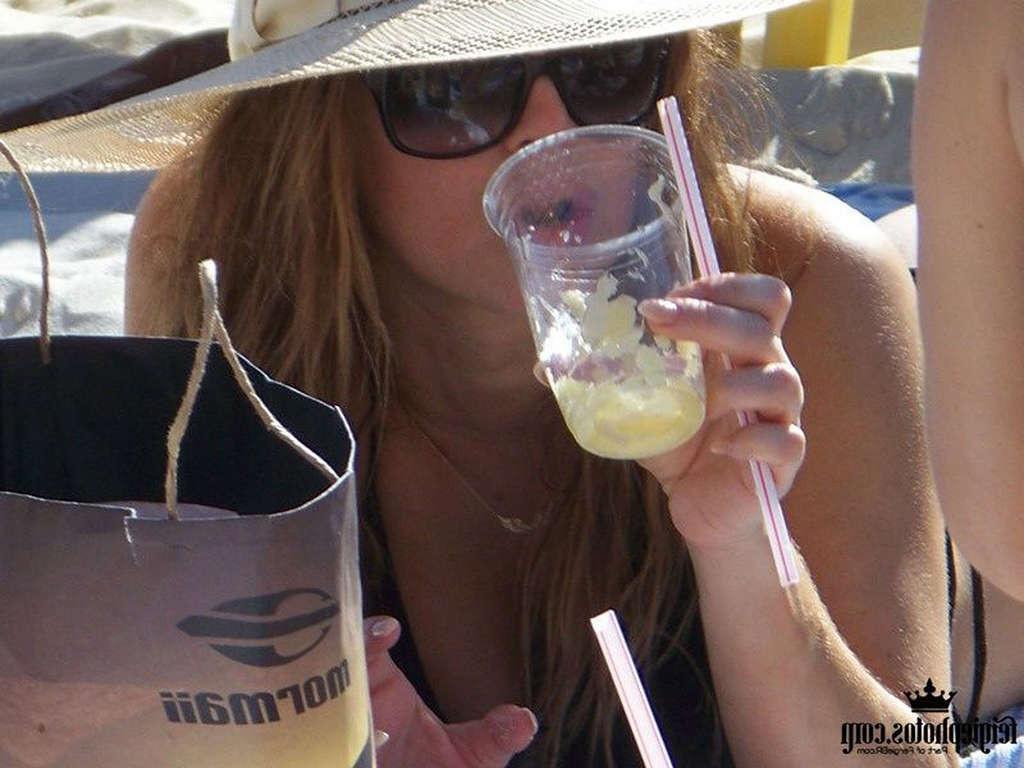 16P Stacy Ferguson showing sexy body and hot ass in thong on beach