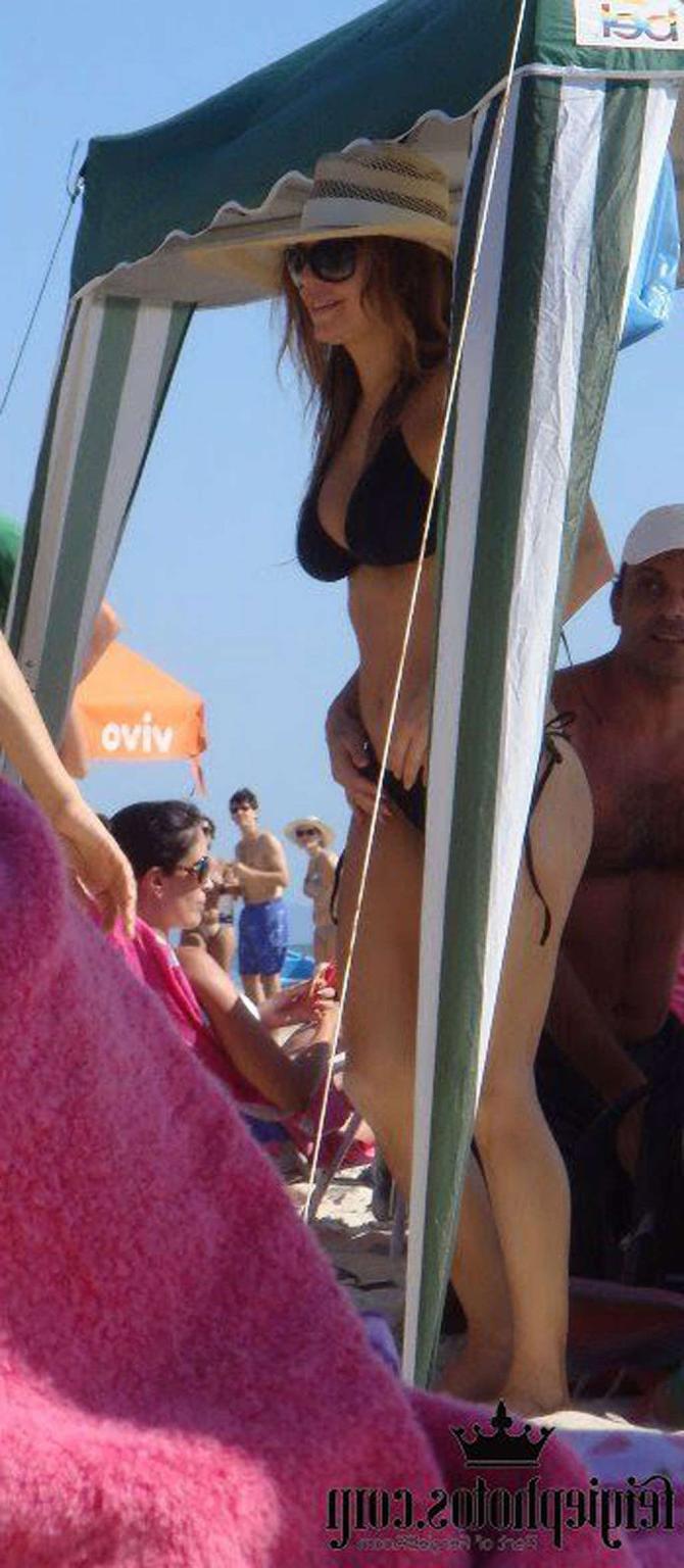 16P Stacy Ferguson showing sexy body and hot ass in thong on beach